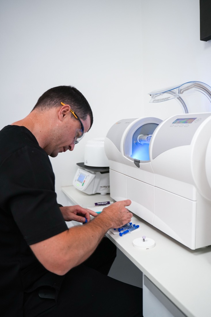 Dr Alberts preparing the CEREC milling unit