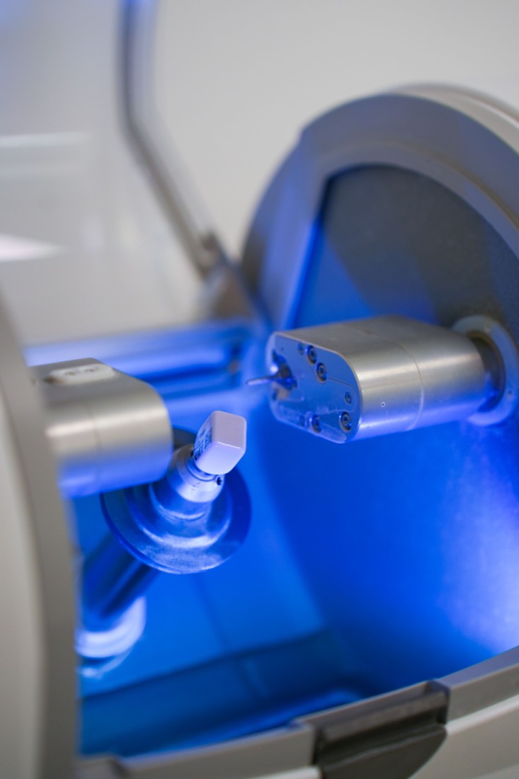 Ceramic restoration being milled by CEREC technology