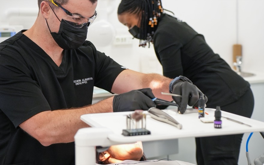 Dr Edwin Alberts fitting porcelain veneers for a patient at Melrose Dental Studio